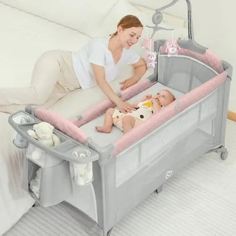 BabyBond Baby Bassinet Bedside Crib Pack and Play with Sheet Diaper Changing Table and Music Mobile from Newborn to Toddles Portable Large Playard